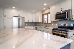 Kitchen Remodeling Example showing new white countertop