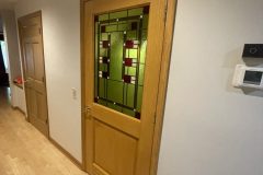 Newly installed interior door with rectangle design window for stylish privacy