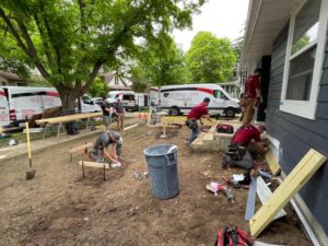 construction team working on building a deck